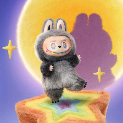 Cute rainbow-eyed toy in gray bunny costume on star platform, moon and stars background